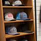 Salt Bandits™  Trucker Hat Charcoal/Columbia Blue